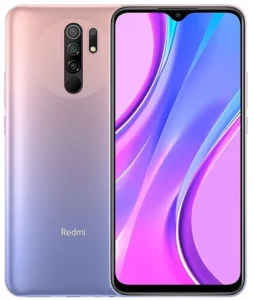 Image of a Xiaomi Redmi 9 smartphone in a gradient sunset purple color. The phone has a quad-camera system on the back, consisting of four circular lenses arranged in a square formation. Text on the phone reads "Redmi" and "AI Quad Camera."